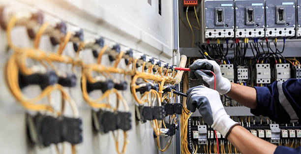 Professional Electrical Panel Upgrade technician working in Woodbury County County, IA